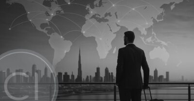 Businessman with luggage looking at a digital world map, symbolizing global mobility through second citizenship